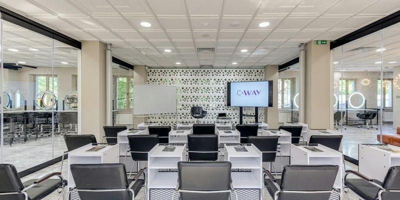 Spacious minimalist training room with dark walls